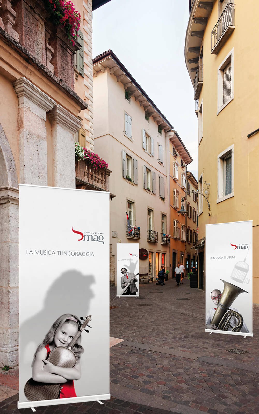 allestimento stradale inaugurazione sede scuola musicale riva, progetto advertising diadestudio arco di trento